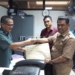 Ketua KPU Kota Gorontalo La Aba, saat menerima salinan Amar Putusan MA, Selasa (20/3), di Jakarta
