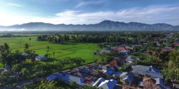 Foto dari udara, suasana sore hari di Kecamatan Tilongkabila.(Foto: Ronny Buol/zonautara.com)