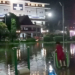 Air menggenangi Lapangan Sparta Tikala, tepatnya di depan Kantor Walikota Manado.