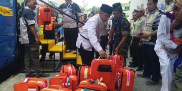 Suasana kedatangan Jamaah Calon Haji asal Kota Gorontalo di Embarkasih Antara Gorontalo, Kamis (25/7/2019).