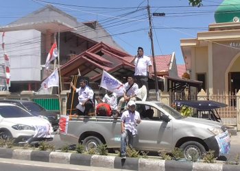 Menolak rencana pemerintah merevisi Undang-Undang Nomor 13 Tahun 2003 tentang Ketenagakerjaan, FSPMI Provinsi Gorontalo menggelar aksi unjuk rasa di sejumlah tempat di Kota Gorontalo, Rabu (14/8/2019).