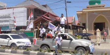 Menolak rencana pemerintah merevisi Undang-Undang Nomor 13 Tahun 2003 tentang Ketenagakerjaan, FSPMI Provinsi Gorontalo menggelar aksi unjuk rasa di sejumlah tempat di Kota Gorontalo, Rabu (14/8/2019).