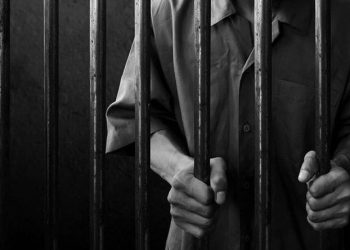 Ilustrasi orang dalam penjara. Foto ilustrasi: Istimewa.