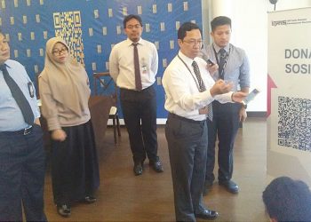 Budi Widihartanto selaku Kepala Kantor Perwakilan Bank Indonesia Provinsi Gorontalo memperkenalkan QR Code yang diberi nama QR Indonesian Standard (QRIS).