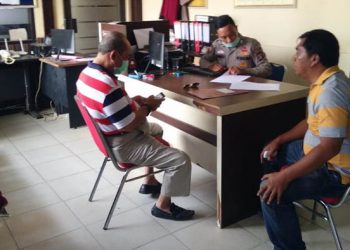 Adhan Dambea saat mendatangi Polres Gorontalo Kota, Jumat (17/4/2020)
