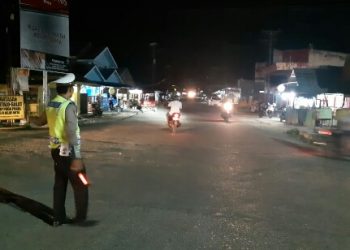 Sosialisasi dan penutupan jalan oleh Lantas Polres Gorontalo Utara bersama Polsek Kwandang