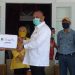 PT Gorontalo Minerals (GM) saat menyerahkan bantuan berupa Alat Pelindung Diri (APD), cairan Disinfektan, Handsanitizer, hingga Handskun, kepada kepada Pemerintah Provinsi Gorontalo, serta dua rumah sakit di Kabupaten Bone Bolango, Kamis (28/5/2020).