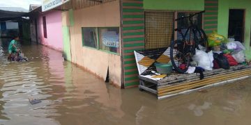 banjir yang terjadi di salah satu wilayah di kabupaten Bone Bolango. Foto: Lukmna Polimengo.