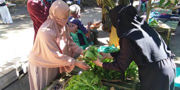 Aktivitas di Pasar Seni Warga yang berada di Desa Huntu Selatan, Kecamatan Bulango Selatan, Kabupaten Bone Bolango.