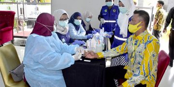 Mencegah penularan virus Corona, pelaksanaan Musyawarah Daerah (Musda) ke X Dewa Pimpinan Daerah (DPD) Partai Golkar Kota Gorontalo, yang digelar di salah satu hotel di Kota Gorontalo, Minggu (21/11/2020), menerapkan Protkes (Protokol Kesehatan) ketat Covid-19.