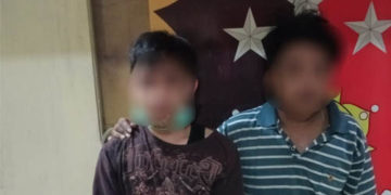 Kedua pelaku penganiayaan saat diamankan di Polres Gorontalo Kota.