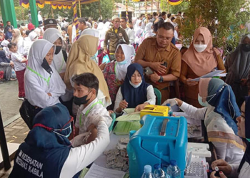 Vaksinasi massal yang dilaksanakan dalam rangka Hari Bhakti Adhyaksa (HBA) ke 62 dan Hari Ulang Tahun Ikatan Adhyaksa Dharmakarini sukses digelar di Kejaksaan Tinggi Gorontalo, Selasa (19/7/2022). Foto : Lukman Polimengo/mimoza.tv.