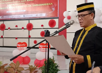 KASI Binadik Lapas kelas II A Gorontalo, Kasdin Lato saat membacakan pemisi bagi warga binaan pemasyarakatan pada momentum peringatan HUT Kemerdekaan RI ke 77, Rabu (17/8/2022). Foto : Lukman Polimengo/mimoza.tv.
