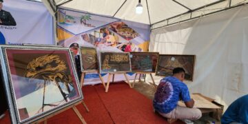 Booth pameran lukisan karya warga binaan Lapas Pohuwato dalam memeriahkan ivent Festival Pesona Pohon Cinta (PPC).