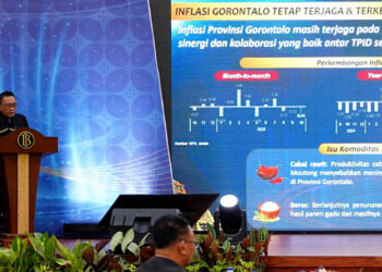 Plh Kepala Perwakilan BI Gorontalo, Ciptoning Suryo Condro, ssaat menyampaikan sambutan pada acara Pertemuan Tahunan Bank Indonesia (PTBI) 2025 di Ballroom lantai 4 KPwBI Gorontalo, Jumat (28/11/2025).