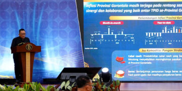 Plh Kepala Perwakilan BI Gorontalo, Ciptoning Suryo Condro, ssaat menyampaikan sambutan pada acara Pertemuan Tahunan Bank Indonesia (PTBI) 2025 di Ballroom lantai 4 KPwBI Gorontalo, Jumat (28/11/2025).