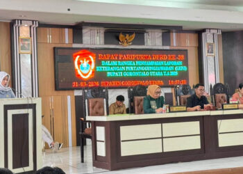 Ketua Komisi III DPRD Gorontalo Utara, Dheninda Chaerunnisa, saat menyampaikan pandangan Fraksi Nasdem dalam rapat paripurna DPRD Gorontalo Utara, Selasa (31/3/2026).